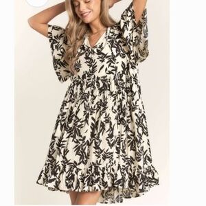 Shop Stevie Ivory Button Down Pleated Leaf Print mini flowy dress medium